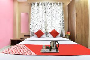 Ліжко або ліжка в номері OYO Flagship 91763 Hotel Midiyan Palace