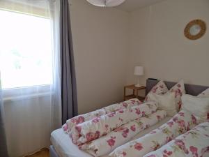 Postel nebo postele na pokoji v ubytování Appartement Fiffinjo