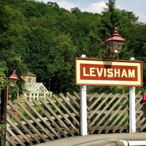 a sign that says lekemark with a light on top of a fence at Grove House Levisham in Pickering