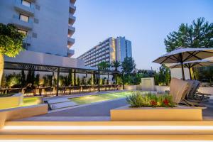 The swimming pool at or close to Divani Escape