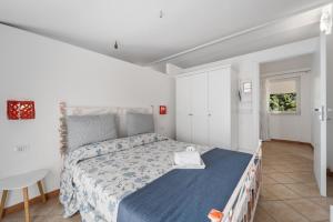 Katil atau katil-katil dalam bilik di Le tenute del mandarino
