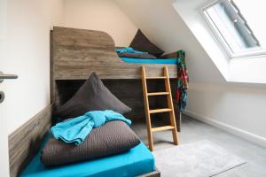 Ein Bett oder Betten in einem Zimmer der Unterkunft Appartementhaus kleines Glück &MeineCardPLUS