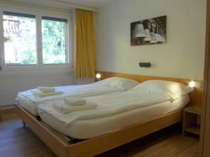 Postel nebo postele na pokoji v ubytování Apartment Attila by Interhome