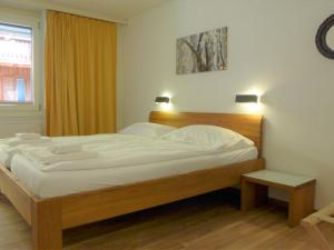 Postel nebo postele na pokoji v ubytování Apartment Attila by Interhome