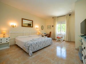 Ένα ή περισσότερα κρεβάτια σε δωμάτιο στο Holiday Home Sandra by Interhome