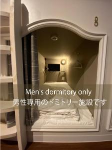 a mirror with the words mens bathroom only at ステイワーク錦糸町 in Tokyo