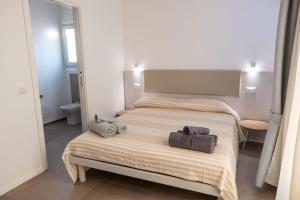 Postel nebo postele na pokoji v ubytování Villa Est