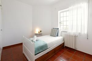 Ένα ή περισσότερα κρεβάτια σε δωμάτιο στο Villa Juno +21 φωτογραφίες