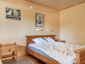 Postel nebo postele na pokoji v ubytování Chalet Enerhögen Lingonet by Interhome