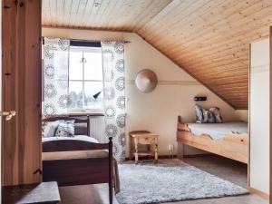 Postel nebo postele na pokoji v ubytování Holiday Home Enerhögen Flädern by Interhome