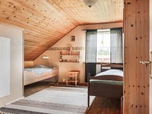 Postel nebo postele na pokoji v ubytování Holiday Home Enerhögen Flädern by Interhome