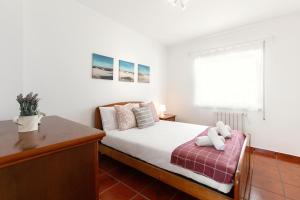 Ένα ή περισσότερα κρεβάτια σε δωμάτιο στο Villa Juno