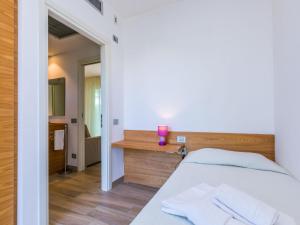 Posteľ alebo postele v izbe v ubytovaní Holiday Home Biovillage-6 by Interhome