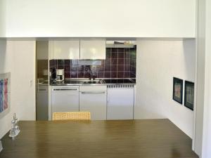 Apartment Triangel A Mohr by Interhomeにあるキッチンまたは簡易キッチン