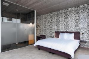 Postel nebo postele na pokoji v ubytování b-smart hotel Menziken + 37 fotografií