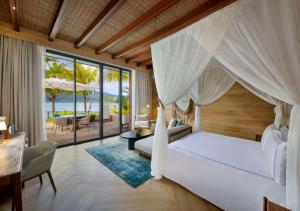 Postel nebo postele na pokoji v ubytování Mango House Seychelles, LXR Hotels & Resorts