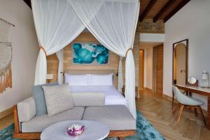 Postel nebo postele na pokoji v ubytování Mango House Seychelles, LXR Hotels & Resorts