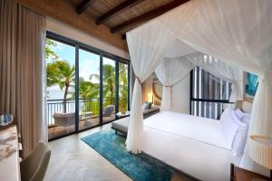 Postel nebo postele na pokoji v ubytování Mango House Seychelles, LXR Hotels & Resorts