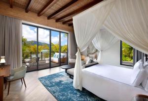 Postel nebo postele na pokoji v ubytování Mango House Seychelles, LXR Hotels & Resorts