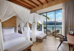 Postel nebo postele na pokoji v ubytování Mango House Seychelles, LXR Hotels & Resorts