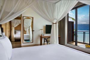 Postel nebo postele na pokoji v ubytování Mango House Seychelles, LXR Hotels & Resorts