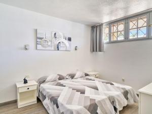 Postel nebo postele na pokoji v ubytování Apartment Sea View Neptuno by Interhome