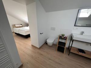 Postel nebo postele na pokoji v ubytování Arbre Epine