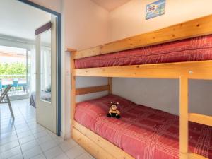 Posteľ alebo postele v izbe v ubytovaní Apartment Les Flamants Roses-9 by Interhome