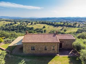an aerial view of a stone house in the countryside at Holiday Home Enea by Interhome in Scansano
