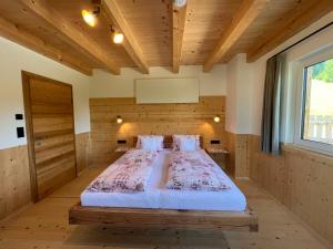 Postel nebo postele na pokoji v ubytování Holiday Home Hettegg Lehen by Interhome