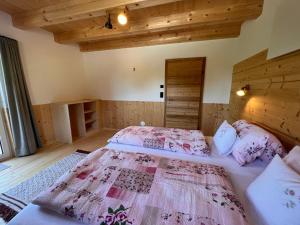 Postel nebo postele na pokoji v ubytování Holiday Home Hettegg Lehen by Interhome