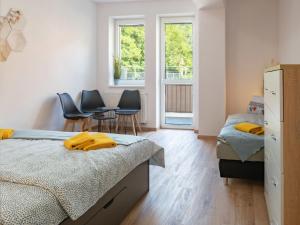Posteľ alebo postele v izbe v ubytovaní Apartment Jáchymov Magdaléna by Interhome