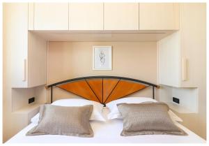 Säng eller sängar i ett rum på Luxury Penthouse Roberta