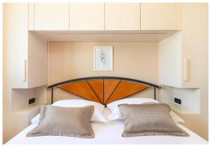 Ένα ή περισσότερα κρεβάτια σε δωμάτιο στο Luxury Penthouse Roberta