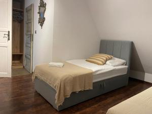 Postel nebo postele na pokoji v ubytování Apartamenty Dorotowo