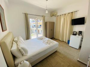 Postel nebo postele na pokoji v ubytování Central Hotel + 37 fotografií