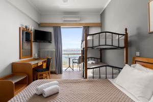 Postel nebo postele na pokoji v ubytování Stefania Hotel + 27 fotografií
