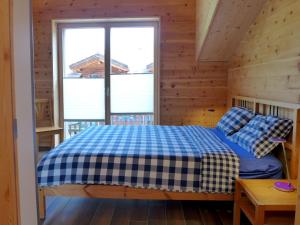 Postel nebo postele na pokoji v ubytování Apartment Beim Ahorn by Interhome