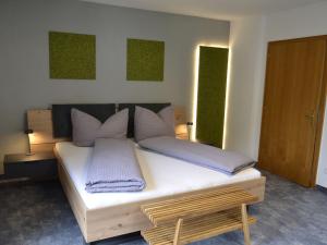 Ένα ή περισσότερα κρεβάτια σε δωμάτιο στο Apartment Apart Hof Achenrainer by Interhome
