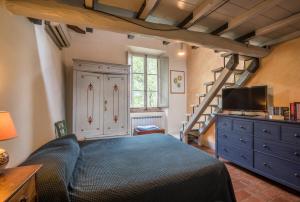 Кровать или кровати в номере Casa Beretone