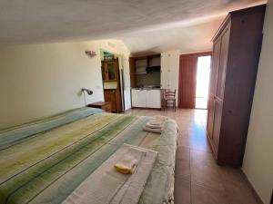 Postel nebo postele na pokoji v ubytování Agriturismo Nardini