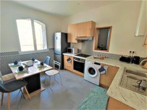 Kuchyňa alebo kuchynka v ubytovaní Appartements - Halles Brauhauban Tarbes