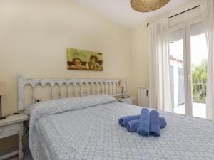En eller flere senger på et rom på Villa Casalot XIII by Interhome