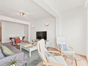 a living room with a couch and chairs at Apartment Puerto Denia Cervantes-2 by Interhome in Denia