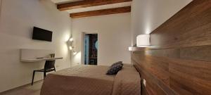 Et tv og/eller underholdning på Claudette Apartments