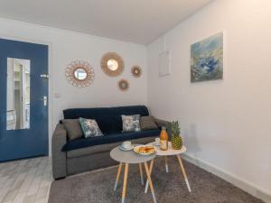 Кът за сядане в Apartment Les Jardins du Couchant by Interhome