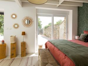Ένα ή περισσότερα κρεβάτια σε δωμάτιο στο Holiday Home La Gentilhommière by Interhome