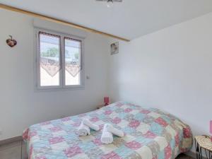 Ένα ή περισσότερα κρεβάτια σε δωμάτιο στο Apartment La Mirapelle 2 by Interhome +9 φωτογραφίες