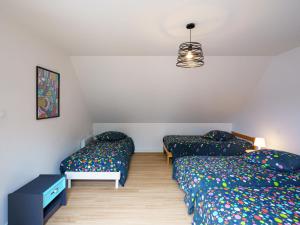 Postel nebo postele na pokoji v ubytování Holiday Home Pointe du Raz by Interhome