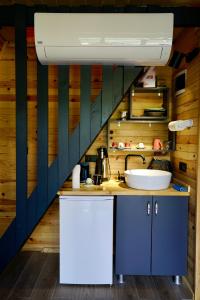 a kitchen with a sink and a counter top at LUSER BUNGALOW in Ardeşen